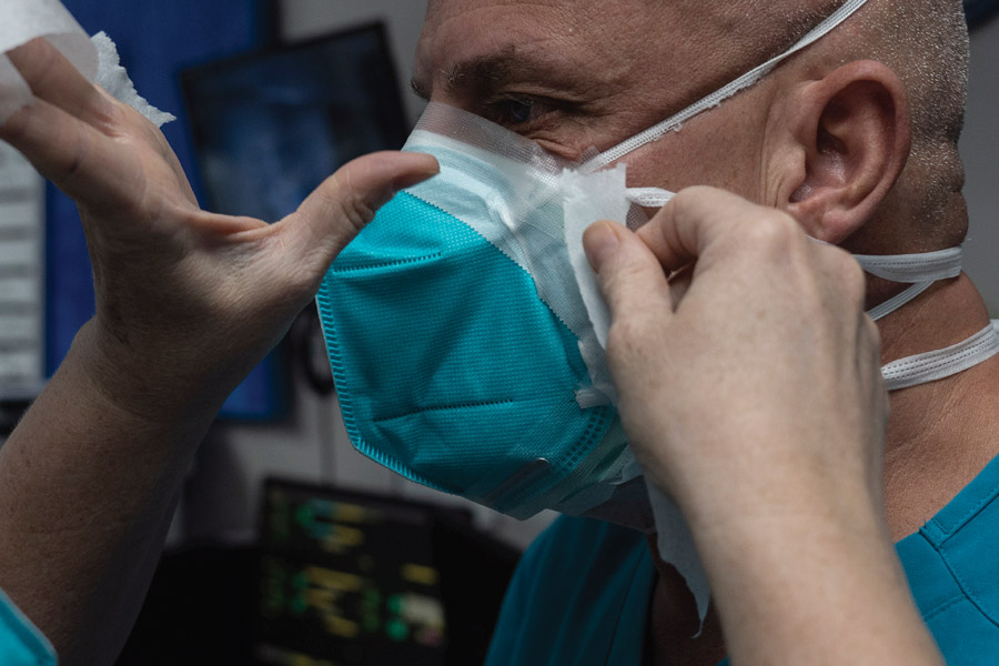 man getting mask put on