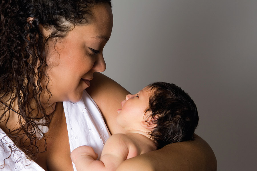 Adult holding baby