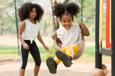 kids swinging