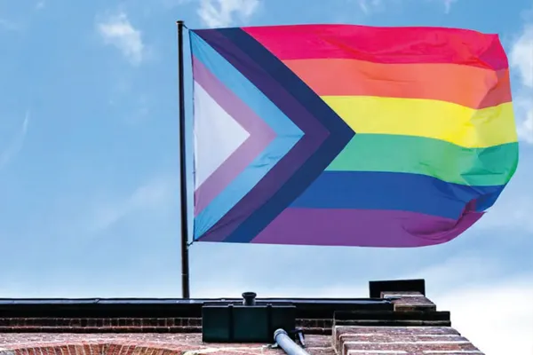 lgbtq+ flag waving in the wind